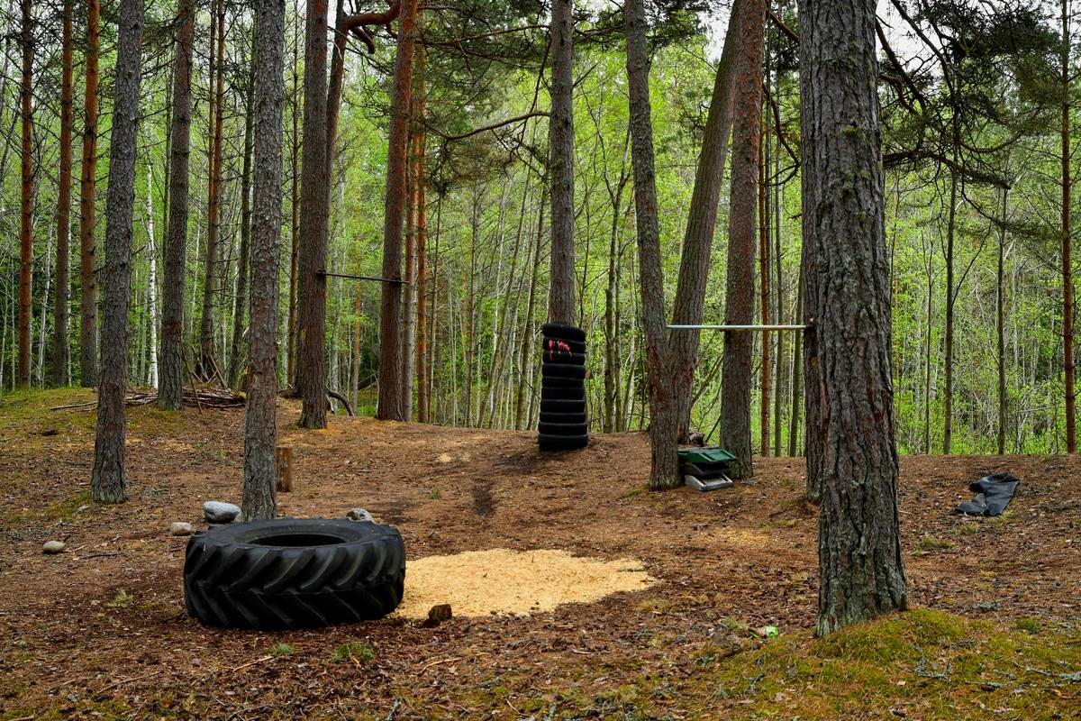 Barefoot runner on forest path demonstrating physical benefits of being outdoors through natural recovery mechanisms